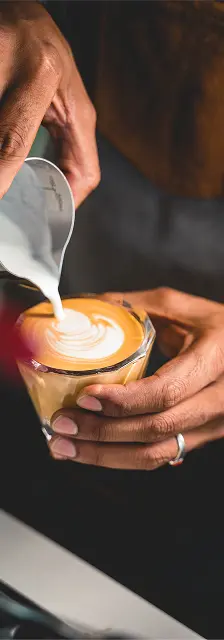 Coffee bar near Perimeter Gardens at Georgetown, offering apartments in Dunwoody.