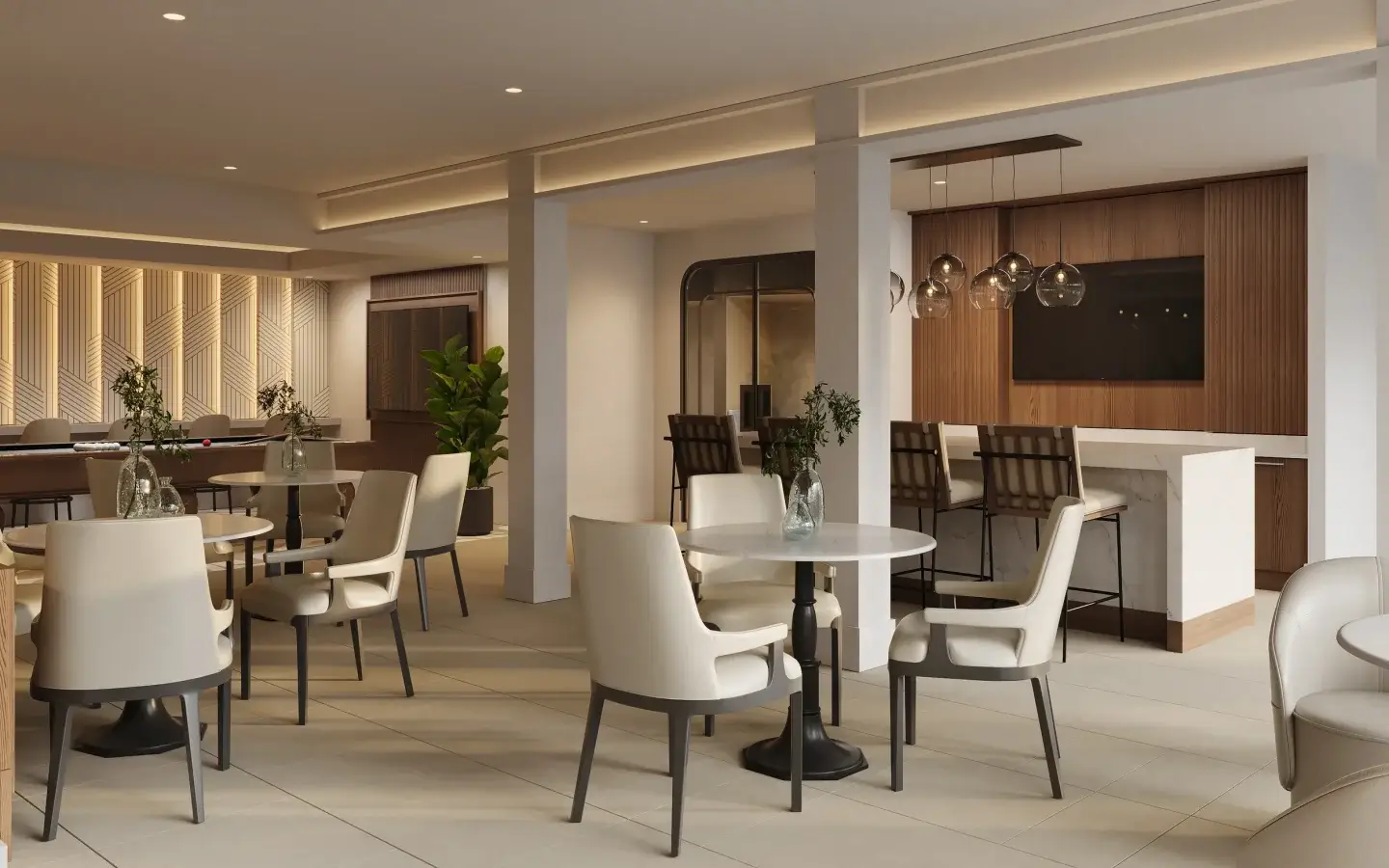 Resident lounge with seating and gathering spaces at Perimeter Gardens at Georgetown.